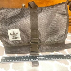 Adidas purse bag. Color-black.